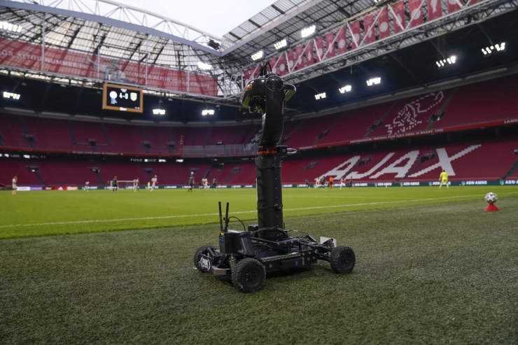 Fotografen hekelen mobiele camera’s langs sportvelden