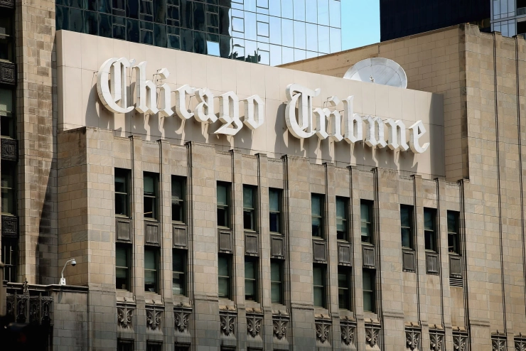 Gannet overweegt bod op Tribune in te trekken