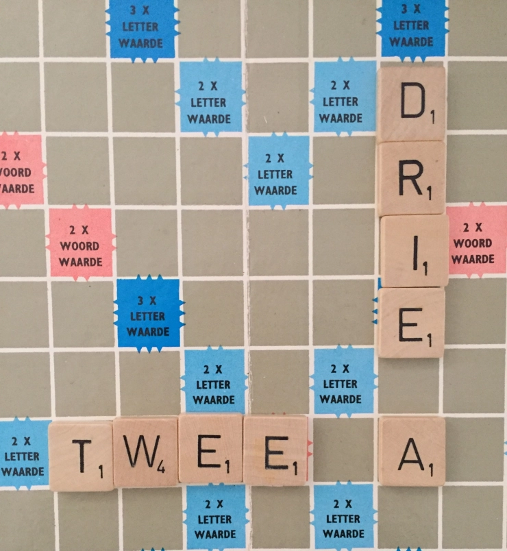 Taaltip: twee à / á drie